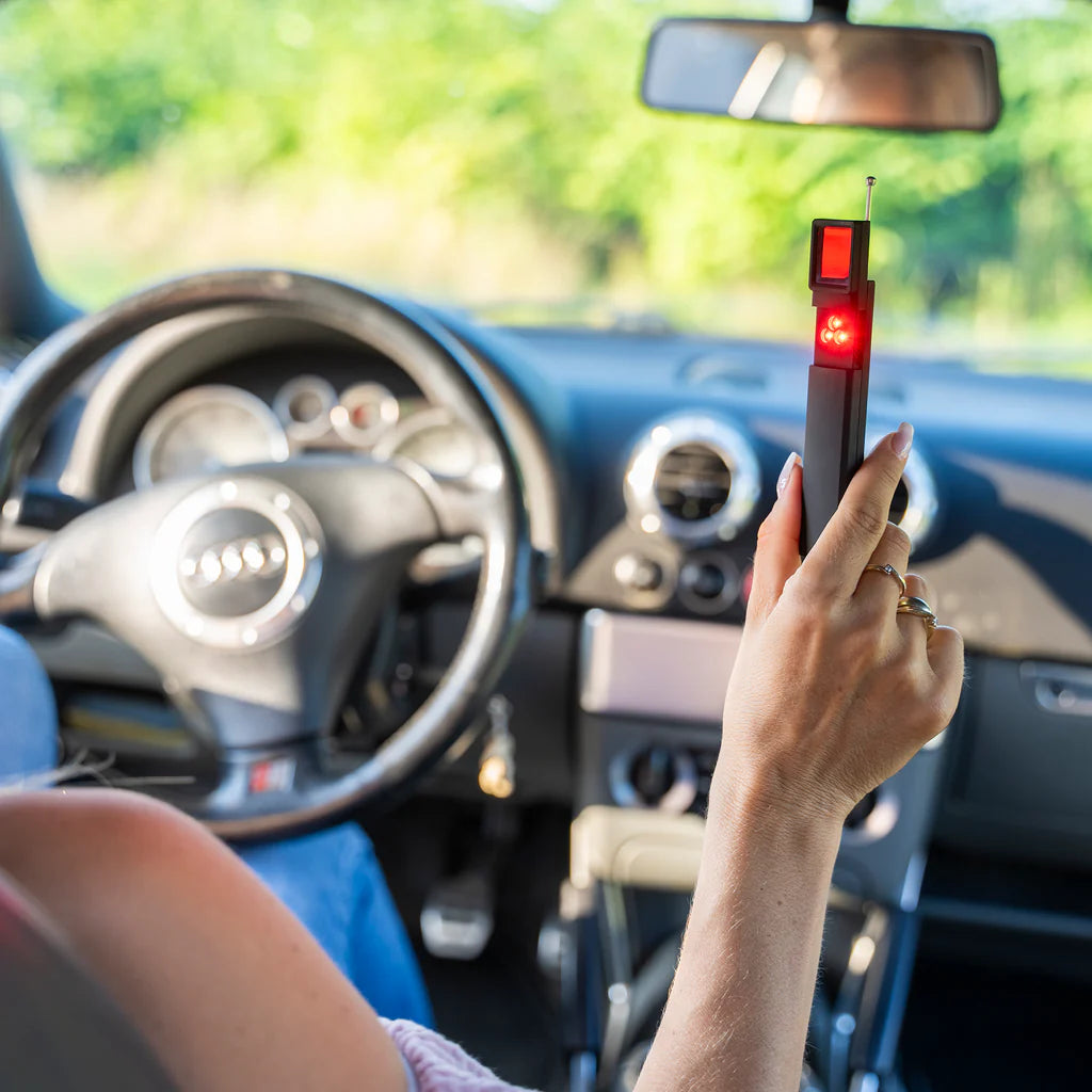 Using a hidden camera spy detector to check a rental car for GPS tracking – Detect unauthorized GPS trackers in vehicles and prevent location monitoring.